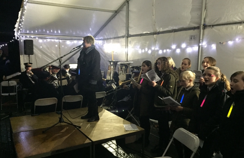 Sir David took part in carol singing in Leigh